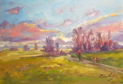 walkers towards sunset on Riddlesdown Common